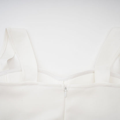 A long white bandage maxi dress with floral applique details named Olivia