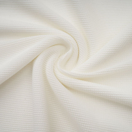 A long white knit maxi dress with glittery floral appliques named Wanda