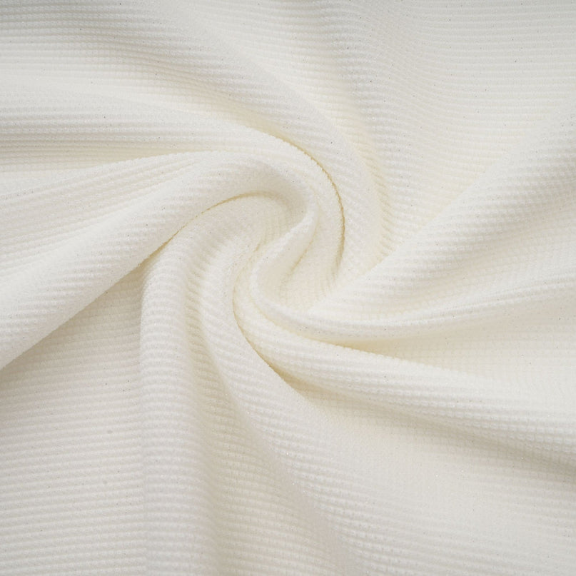 A long white knit maxi dress with glittery floral appliques named Wanda