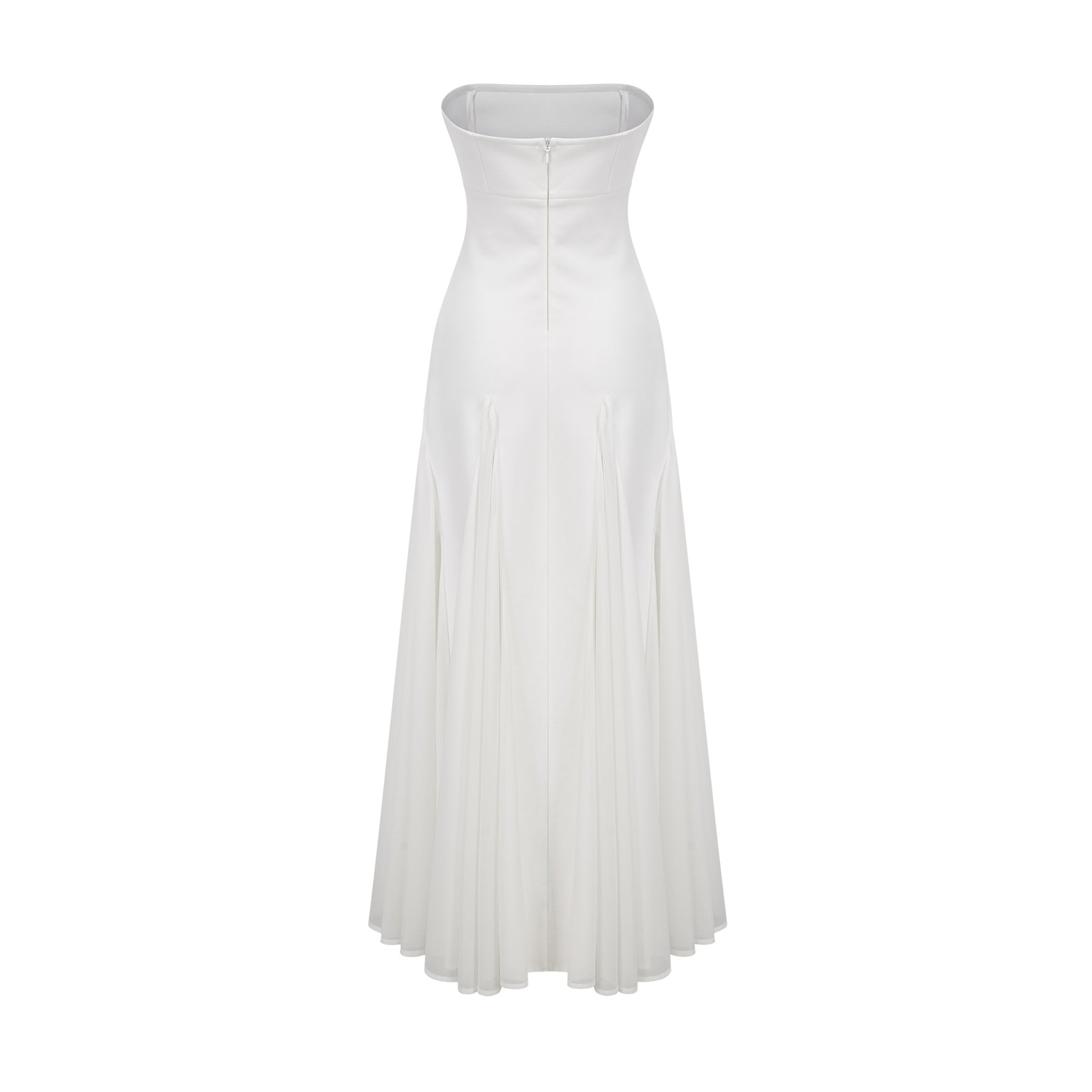 A long white maxi dress with tulle paneling details named Nathalie featuring a flowy silhouette and delicate fabric