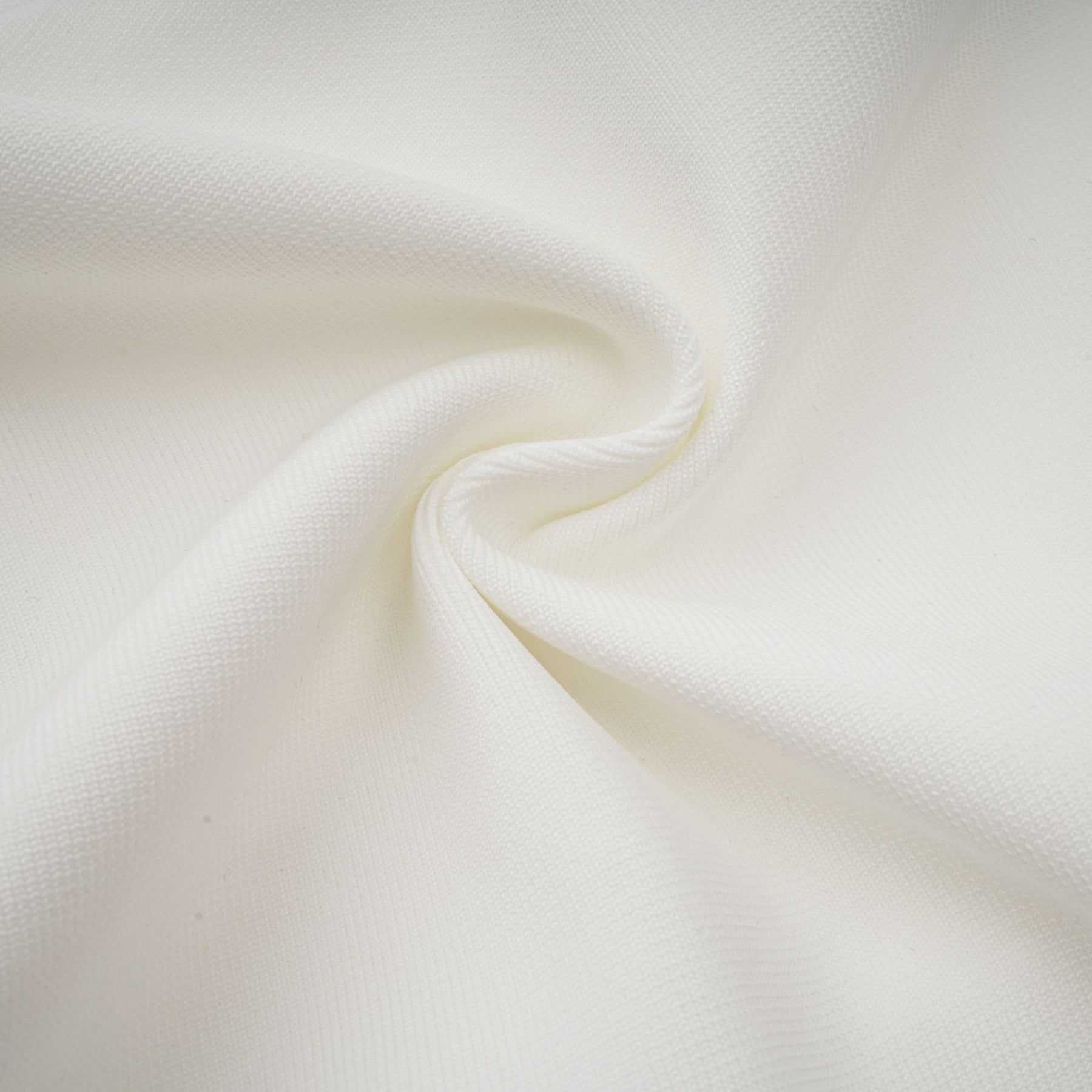 A long white maxi dress with tulle panelling named Nathalie featuring a flowy silhouette and delicate details