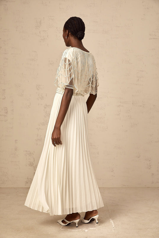 A long white pleated maxi dress with crystal embellishments named Xenia