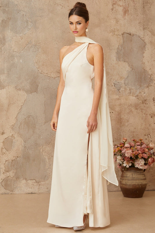 A long white satin maxi dress with a scarflike design detail featuring flowing fabric and an elegant silhouette