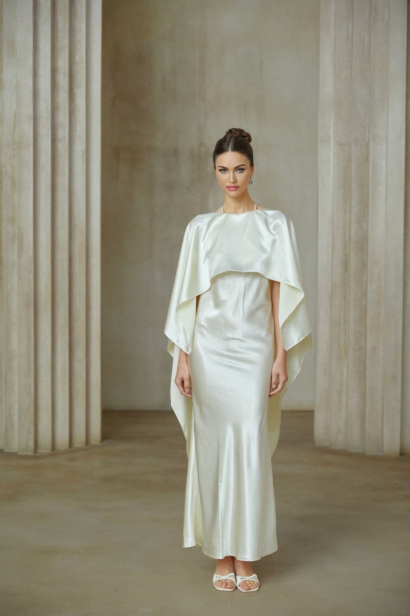 A long white satin maxi dress with a shawl panel detail named Rosalie