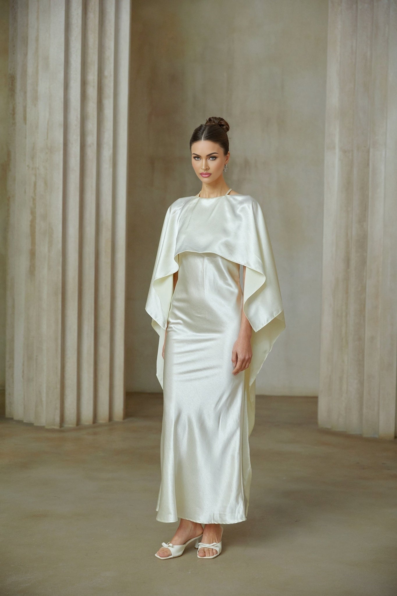 A long white satin maxi dress with a shawl panel detail named Rosalie