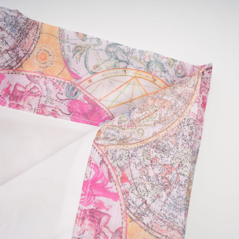 A matching set consisting of a cherry pink shirt and skirt both featuring a pattern print design