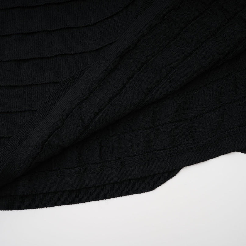 A midi dress with a snake pattern print featuring godet inserts and a fitted silhouette named Anna