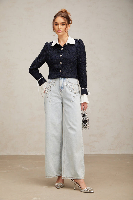 A navy blue tweed jacket with paneled design named Doriane