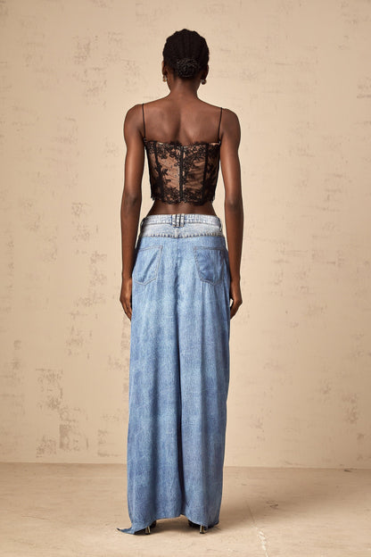 A pair of blue layered denim jeans named Ysabella featuring a stylish layered design