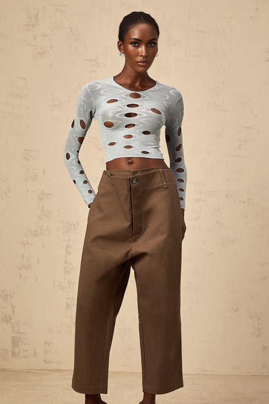 A pair of brown wideleg trousers with shirred detailing and a cropped length named Ophélie