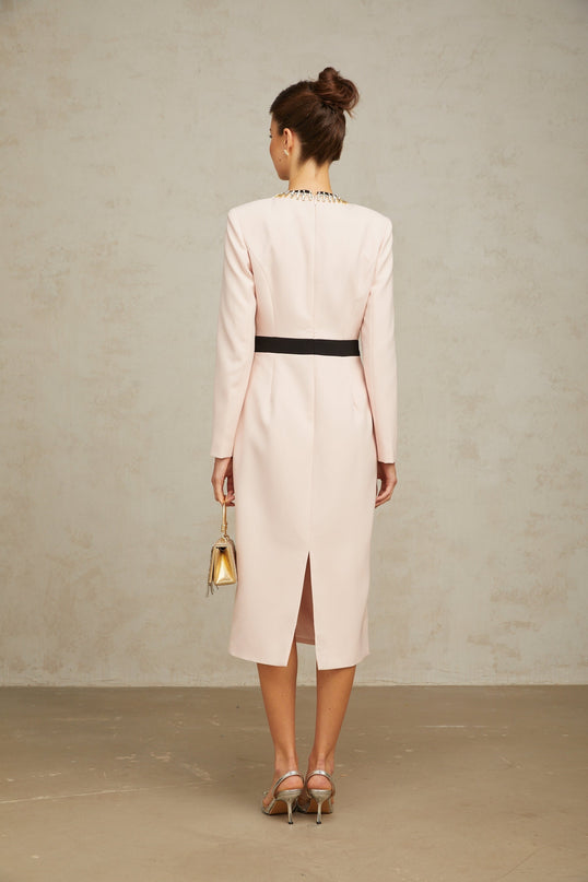 A pink and crystal colorblocked midi dress with the name Anais featuring a sleek design and contrasting panels