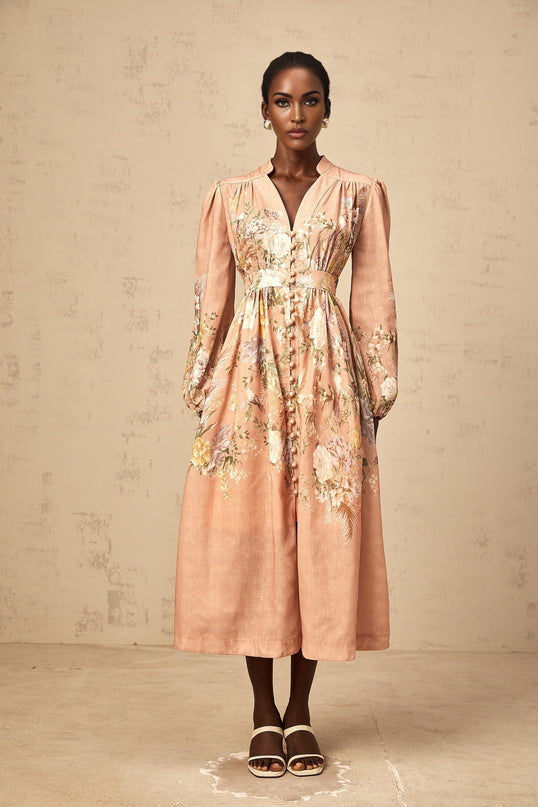 A pink floral print midi dress with a Vneck neckline named Sidonie