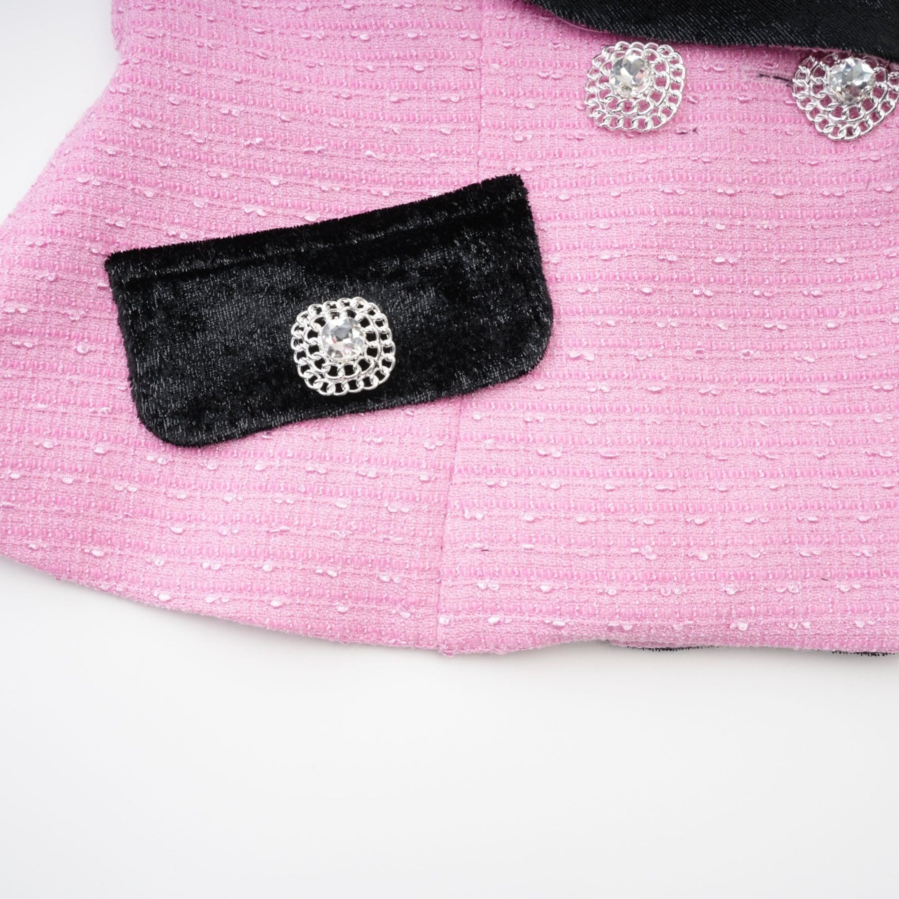 Pink jacket with Vshaped collar front buttons and fitted waist