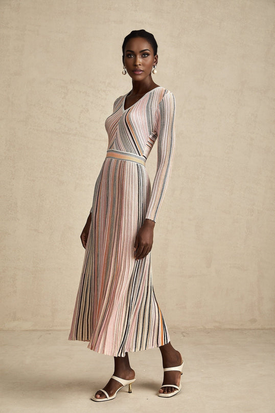 A pink metallic midi dress with pleated design named Mathilde featuring a shimmering finish and midlength hemline
