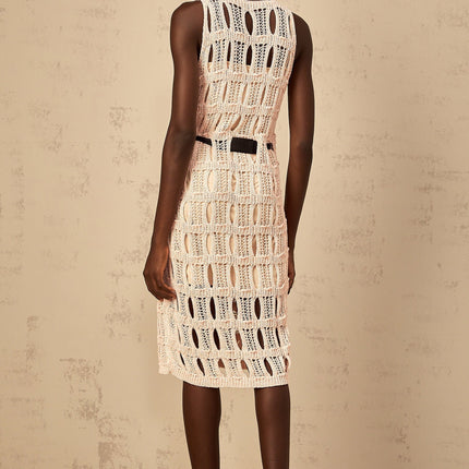 A pink midi dress with a crochet knit texture and a prominent bowknot detail named Elodie