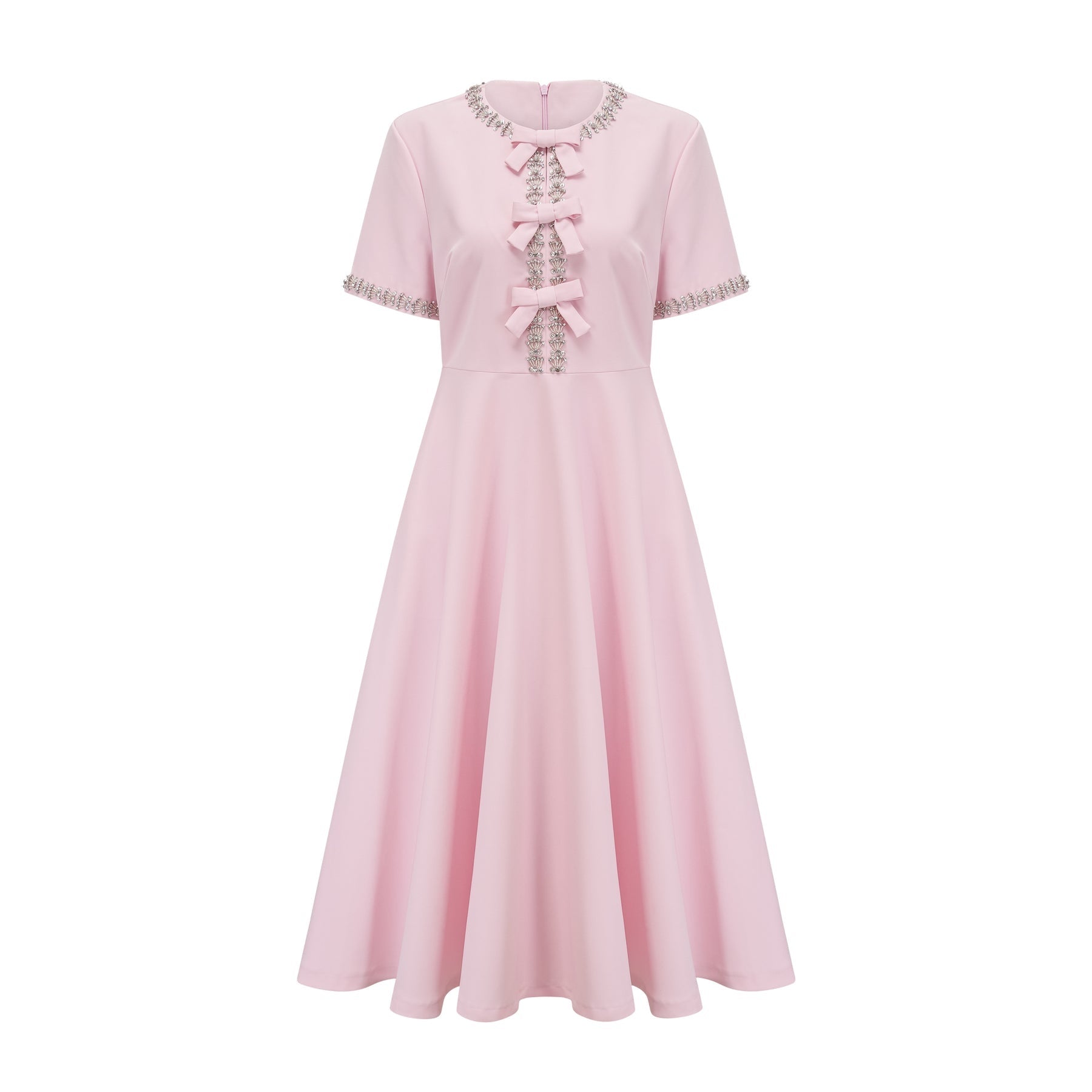 A pink midi dress with a large bow detail adorned with crystal accents named Cassiopeia