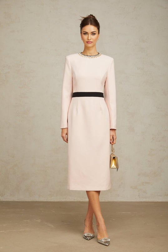 A pink midi dress with crystal embellishments and colorblocked design featuring a sleek silhouette and elegant details