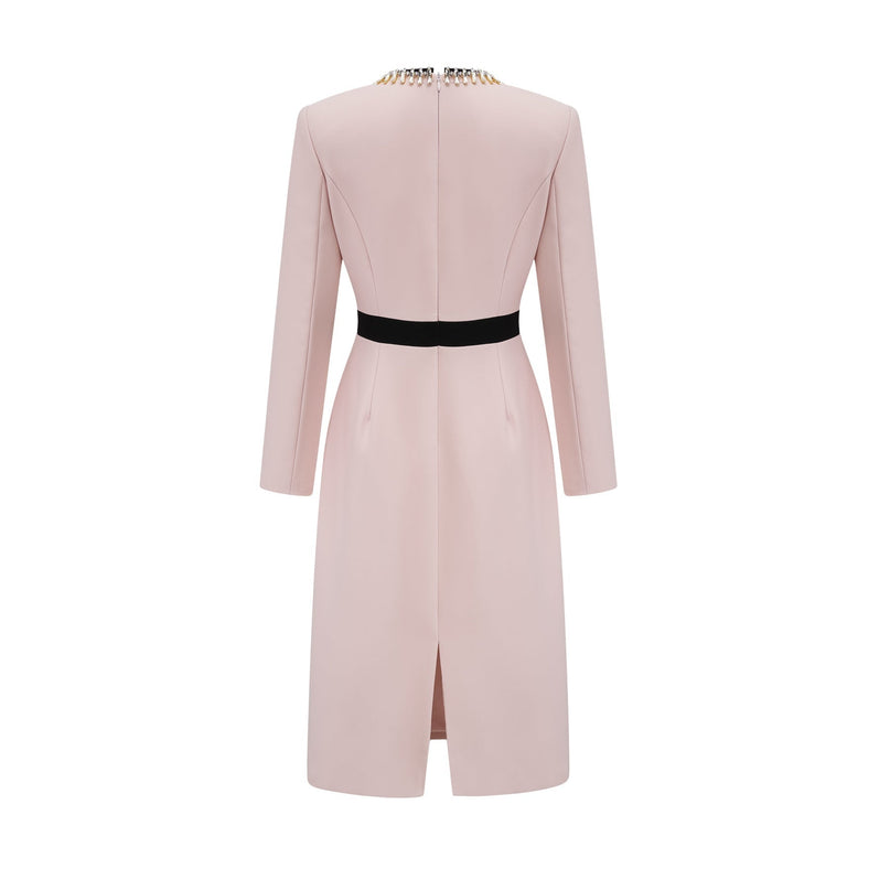 A pink midi dress with crystal embellishments and colorblocked design featuring the name Anais