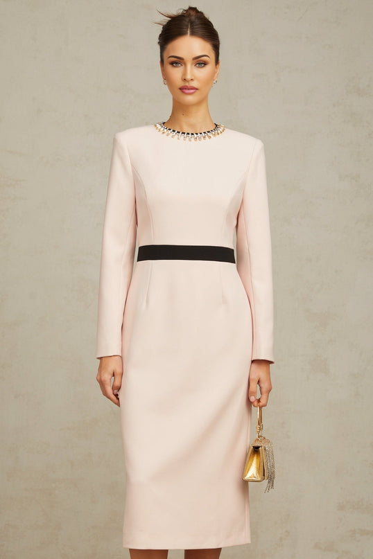 A pink midi dress with crystal embellishments and colorblocked design featuring the name Anais