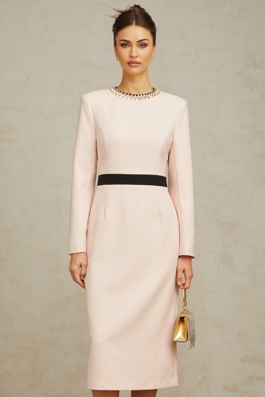 A pink midi dress with crystal embellishments and colorblocked design featuring the name Anais