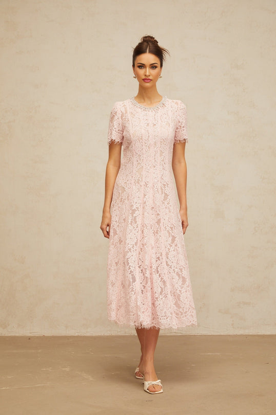 A pink midi dress with floral lace pattern and embellishments named Dulcie