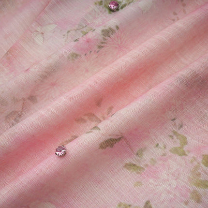 A pink midi dress with floral print and embellishments featuring a Narcisse design