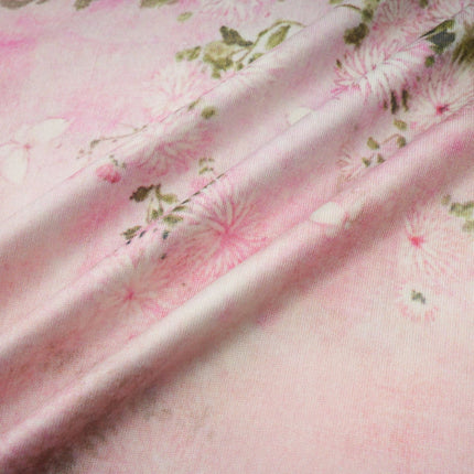 A pink midi dress with floral print and embellishments featuring a Narcisse design