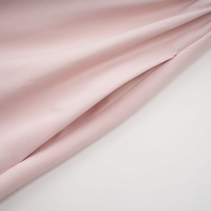 Pink sleeveless dress with spaghetti straps bustier style pleated design and flared skirt Features rear zip midi length and side pockets Comfortable polyester and viscose blend