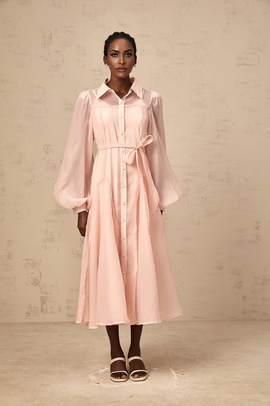 A pink midi length shirt dress with a tied waist detail named Sibylle