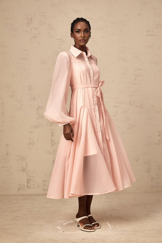 A pink midi length shirt dress with a tied waist detail named Sibylle