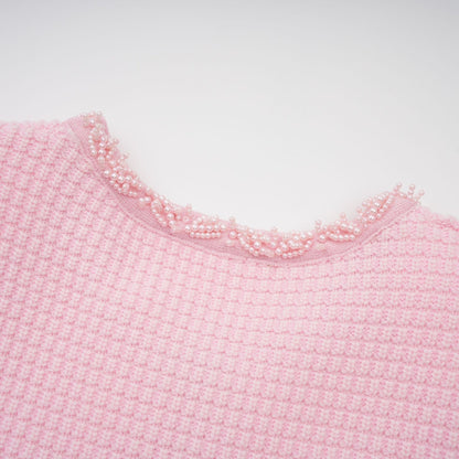 A pink mini dress with a knit texture and beaded embellishments named Eugenie