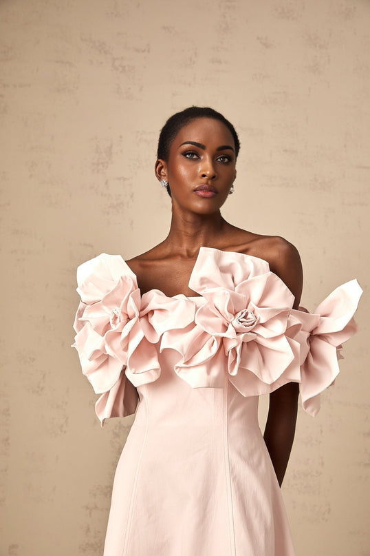 A pink offshoulder midi dress with 3D petal details named Juliette
