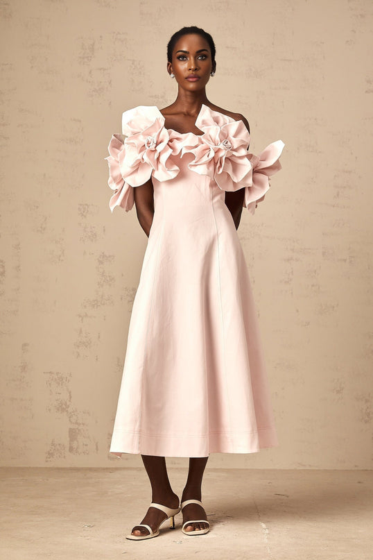 A pink offshoulder midi dress with 3D petal details named Juliette