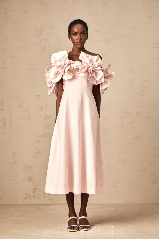 A pink offshoulder midi dress with 3D petal details named Juliette