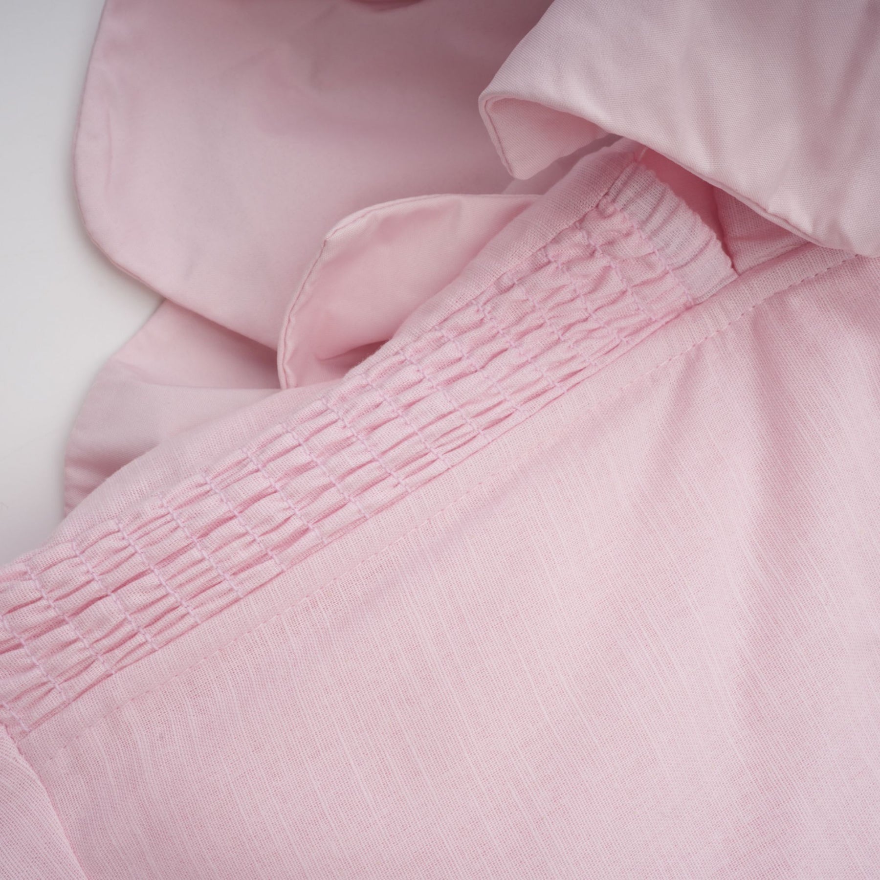 A pink offshoulder midi dress with 3D petal details named Juliette