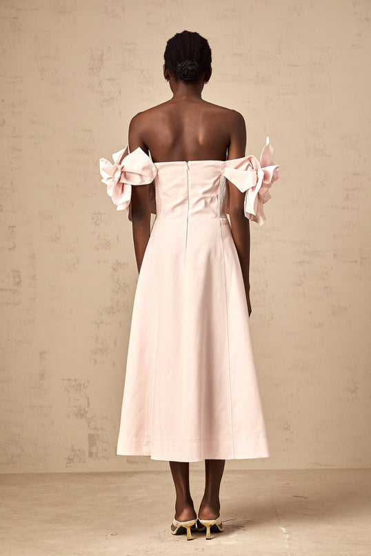 A pink offshoulder midi dress with 3D petal details named Juliette