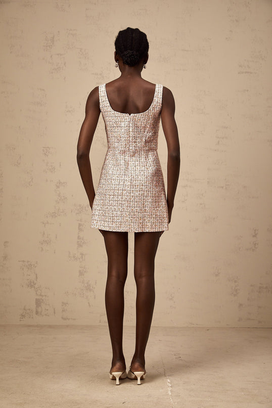 A pink tweed mini dress with embellishments named Aoife featuring a short length and textured fabric