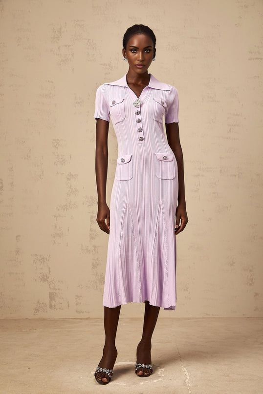 A purple ribbed knit midi dress with a flared hem and long sleeves named Celeste