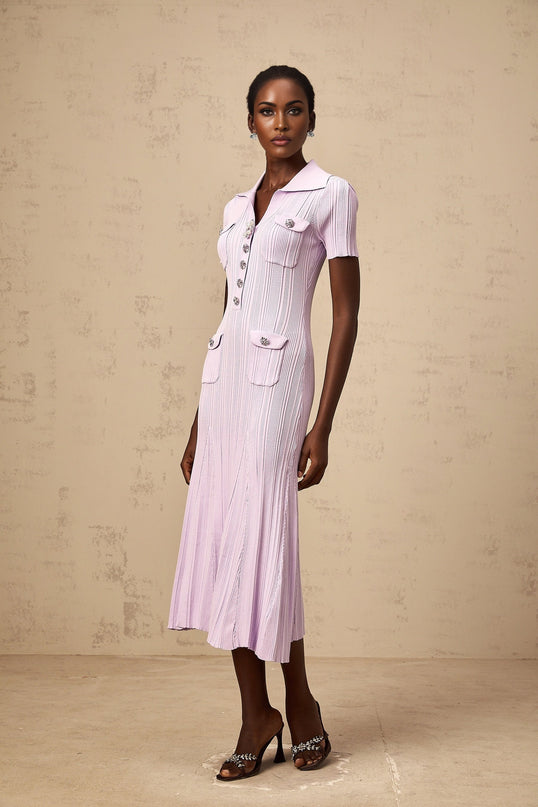 A purple ribbed knit midi dress with a flared hem named Celeste