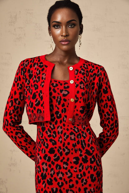 A red cardigan with a leopard print pattern made from shimmery lurex fabric