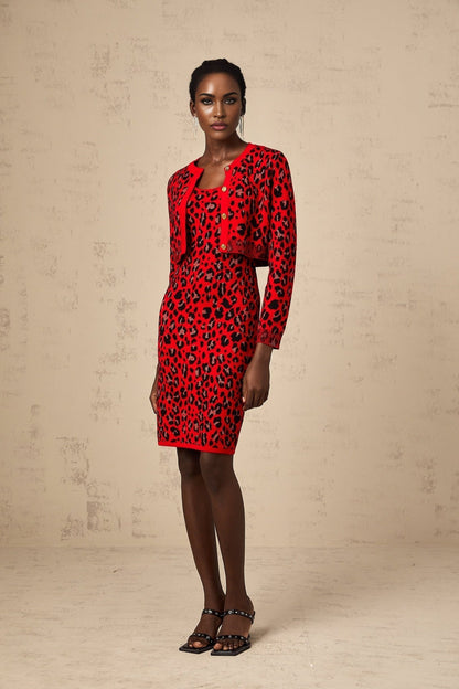 A red leopard print cardigan with metallic lurex threads shimmering throughout the fabric