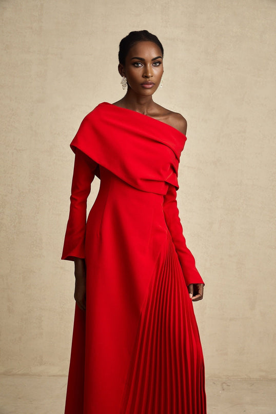 A red maxi dress with a high slit and pleated skirt suitable for Valentines Day