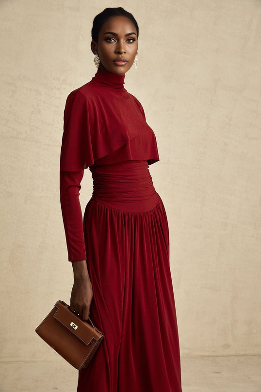 A red midi dress with a flap design and ruched detailing named Camille featuring a fitted silhouette and mid length hem