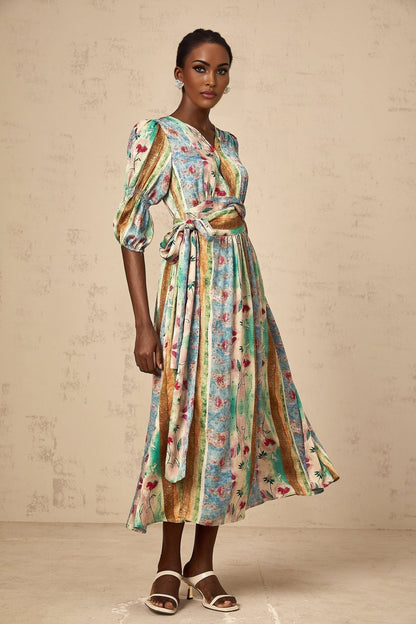 A red midi dress with a floral print pattern and wrap style design