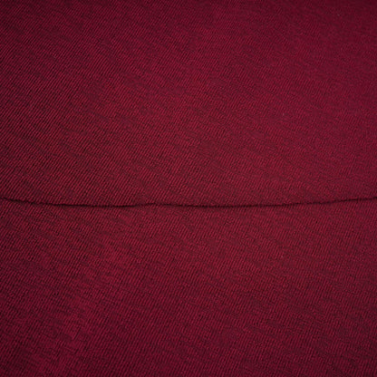 A red midi dress with ruched detailing and a flap design named Camille