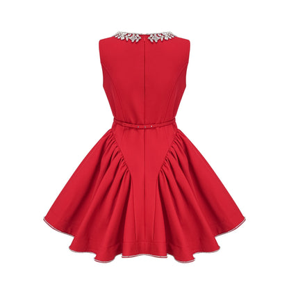 A red mini dress with pleated details and embellishments named Leonie