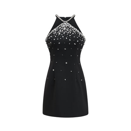 A short black mini dress with decorative embellishments called Xanthea