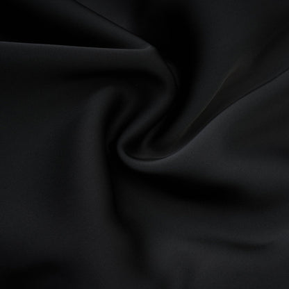 A sleeveless black dress with spaghetti straps square neck draped design rear zip fastening and mini length Made of 80% Polyester 20% Cotton