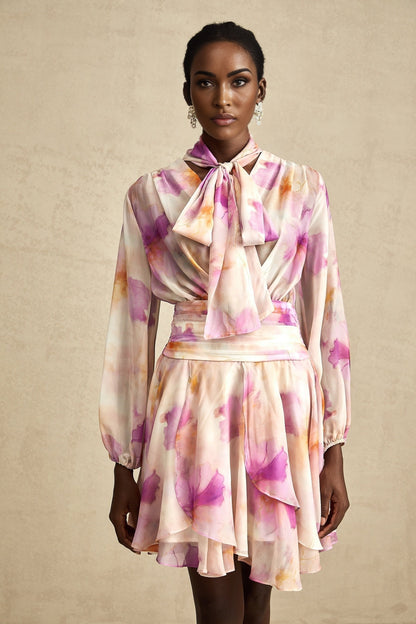 A short floral print dress with a V neckline and mini length from the brand Maelys
