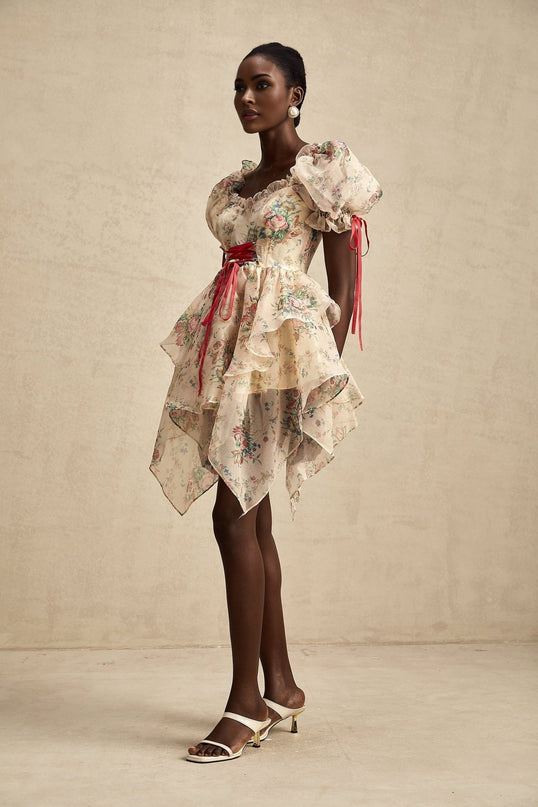 A short floral print tulle mini dress with multiple layers and tieup details named Salome